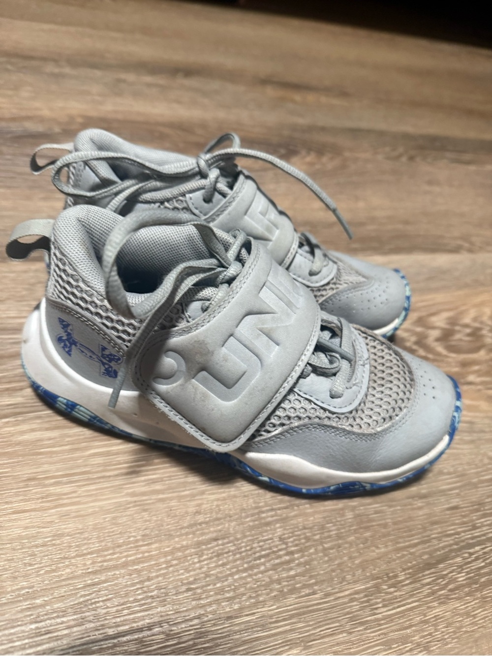 Under Armour Gray Kids Athletic Sneakers with Blue Accent
